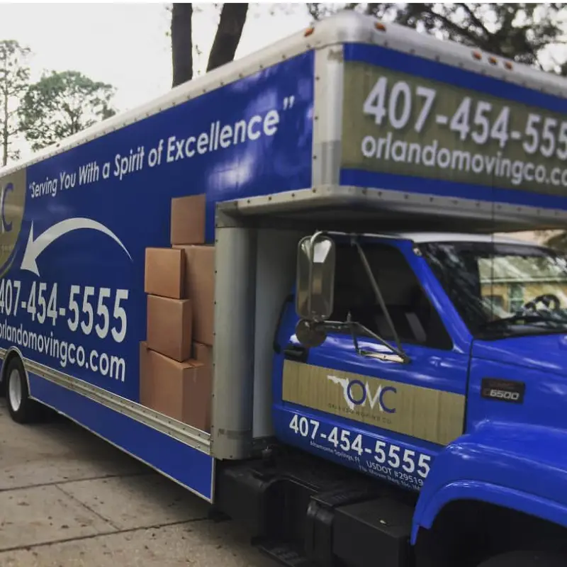 Orlando Moving Company truck with 407-454-5555 and orlandomovingco.com on the side
